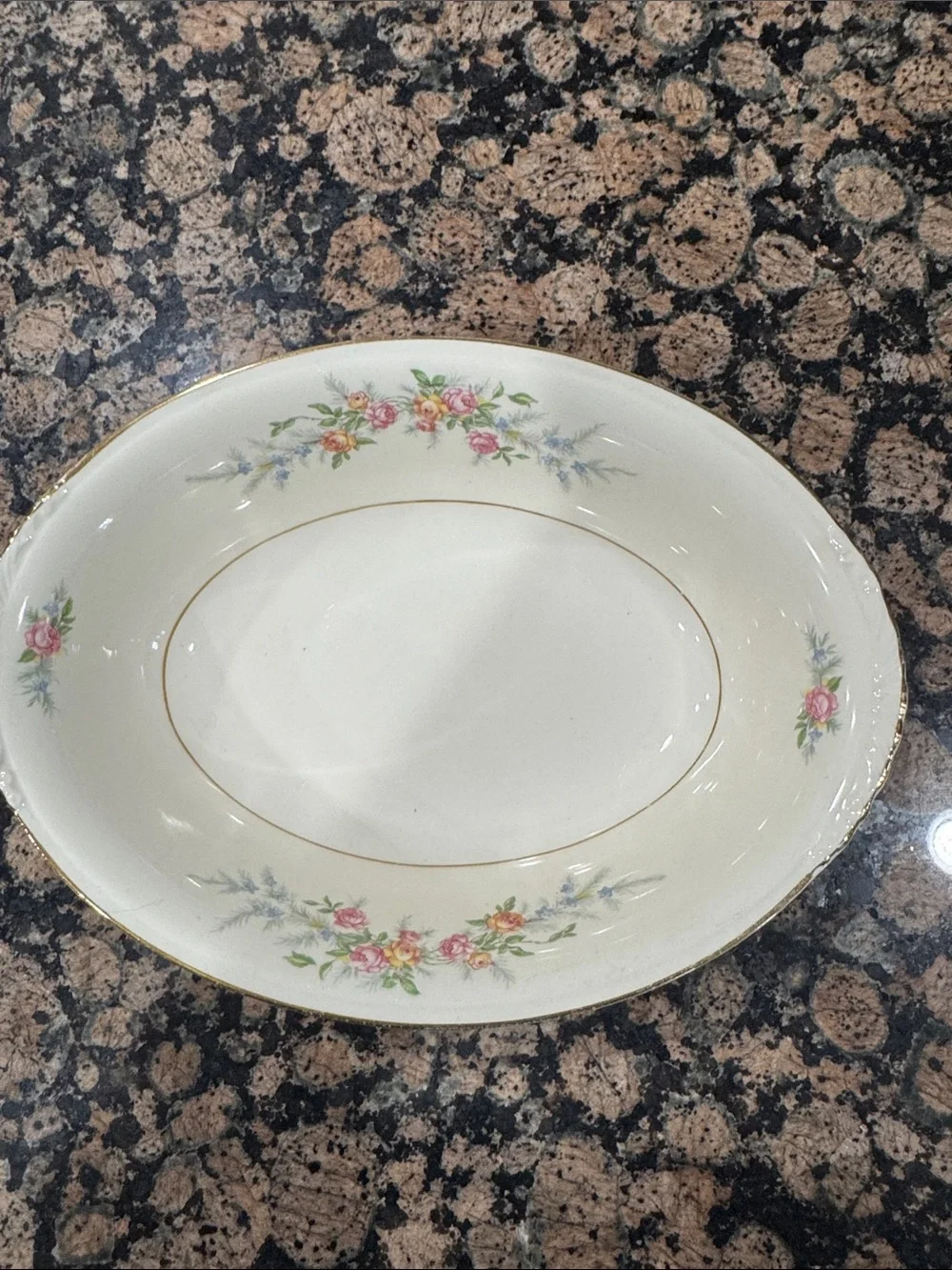Nautilus Ivory Porcelain Serving Bowl with Pink and Yellow Floral Accents